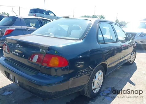 1999 Toyota Corolla Ce из США, поврежденный, VIN 2T1BR12E1XC119351